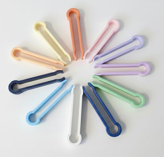 Pince pour bac sensoriel